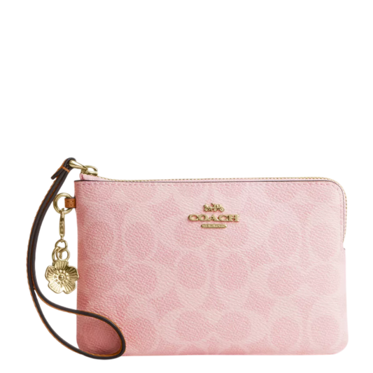 Monedero Coach Corner Zip Wristlet In Signature Canvas With Charms Powder Pink